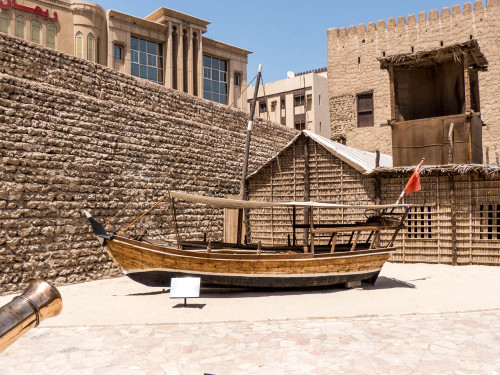 Dhow in Dubai Museum with walls built using coral & mud