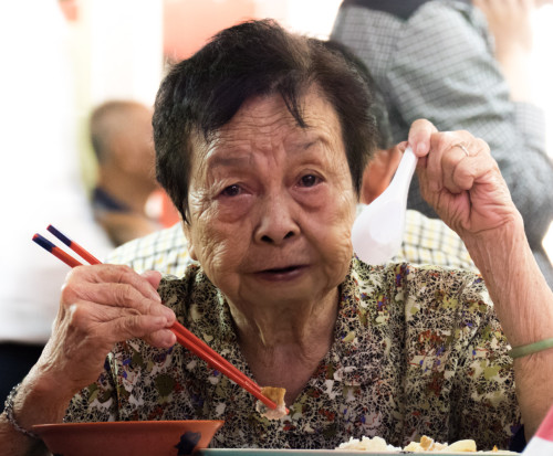 Lady at Hawker Centre Food Court