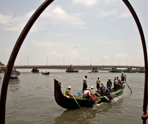 Fishermen turning up at fish market to auction their catch