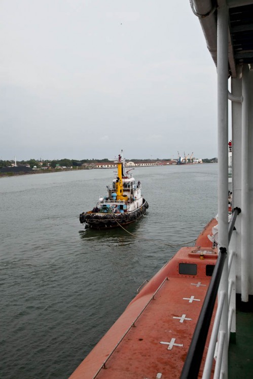 Tug pulling ship from the parking bay